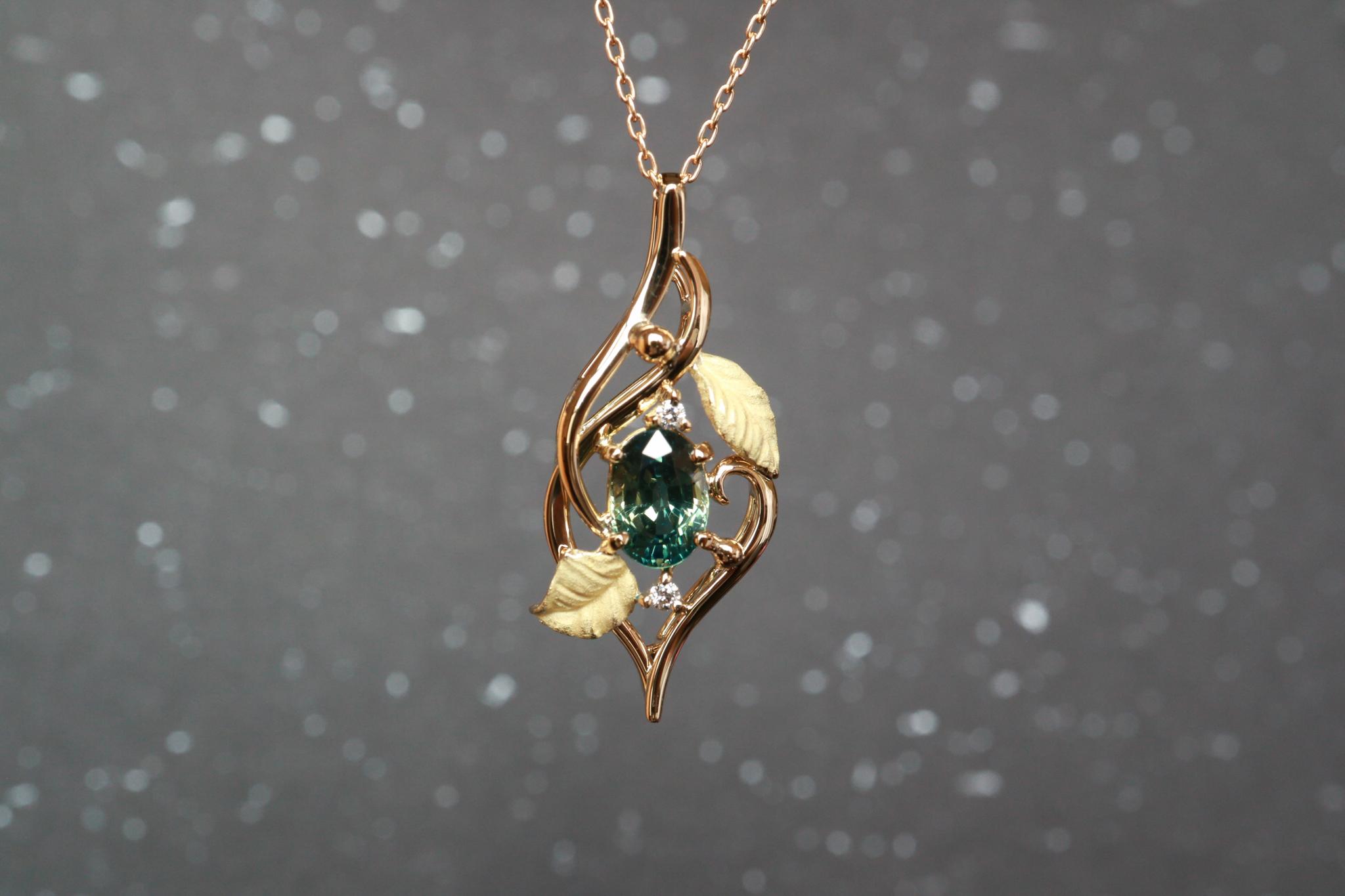 ティールサファイア　リーフデザイン　ペンダントトップ１８金イエローゴールド　ダイヤモンド入り