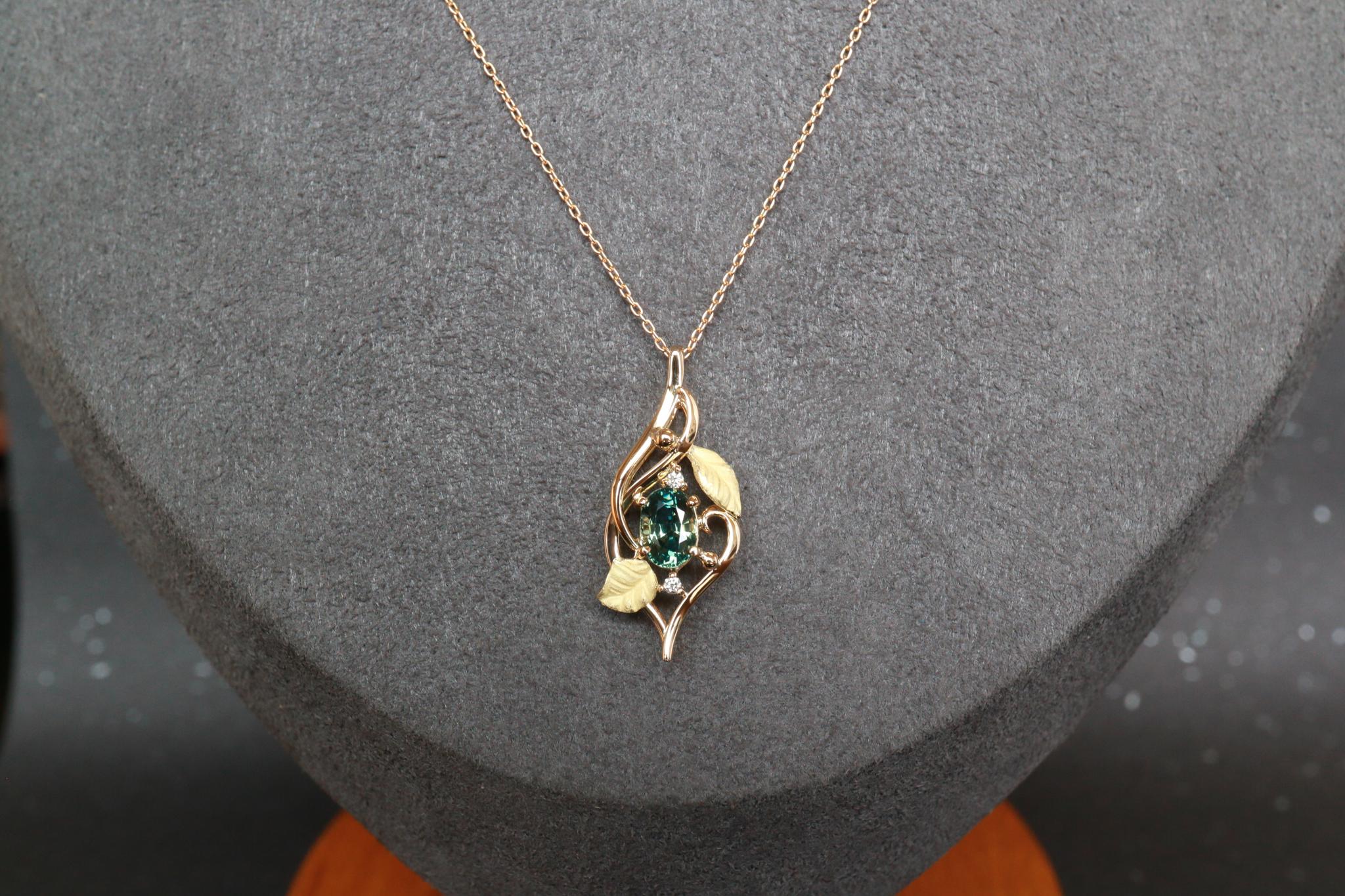 ティールサファイア　リーフデザイン　ペンダントトップ１８金イエローゴールド　ダイヤモンド入り | 2枚目